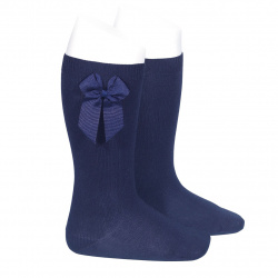 Buy Knee-high socks with grossgrain side bow NAVY BLUE in the online store Condor. Made in Spain. Visit the GROSGRAIN BOW SOCKS section where you will find more colors and products that you will surely fall in love with. We invite you to take a look around our online store.