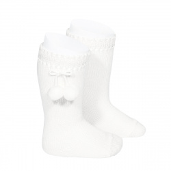 Buy Perle knee high socks with pompoms WHITE in the online store Condor. Made in Spain. Visit the POMPOM BABY SOCKS section where you will find more colors and products that you will surely fall in love with. We invite you to take a look around our online store.