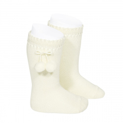 Buy Perle knee high socks with pompoms BEIGE in the online store Condor. Made in Spain. Visit the POMPOM BABY SOCKS section where you will find more colors and products that you will surely fall in love with. We invite you to take a look around our online store.
