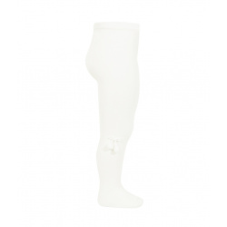 Buy Baby cotton tights with small pompoms CREAM in the online store Condor. Made in Spain. Visit the COTTON TIGHTS WITH POMPOMS section where you will find more colors and products that you will surely fall in love with. We invite you to take a look around our online store.
