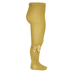 Buy Tights with side grossgran bow MUSTARD in the online store Condor. Made in Spain. Visit the TIGHTS WITH BOWS section where you will find more colors and products that you will surely fall in love with. We invite you to take a look around our online store.