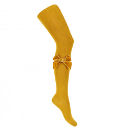 Buy Side velvet bow tights MUSTARD in the online store Condor. Made in Spain. Visit the TIGHTS WITH BOWS section where you will find more colors and products that you will surely fall in love with. We invite you to take a look around our online store.