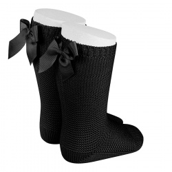 Buy Garter stitch knee high socks with bow BLACK in the online store Condor. Made in Spain. Visit the PERLE BABY SOCKS section where you will find more colors and products that you will surely fall in love with. We invite you to take a look around our online store.