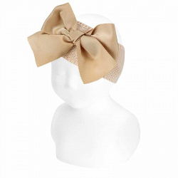 Buy Garter stitch headband with large grosgrain bow LINEN in the online store Condor. Made in Spain. Visit the Happy Price section where you will find more colors and products that you will surely fall in love with. We invite you to take a look around our online store.