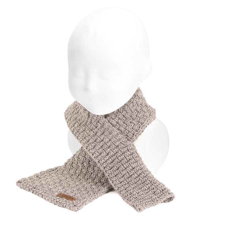 Buy Baby crossed scarf in merino wool blend NOUGAT in the online store Condor. Made in Spain. Visit the Collars and scarves section where you will find more colors and products that you will surely fall in love with. We invite you to take a look around our online store.