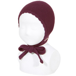 Buy Classic garter stitch bonnet GARNET in the online store Condor. Made in Spain. Visit the BONNETS section where you will find more colors and products that you will surely fall in love with. We invite you to take a look around our online store.