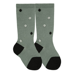 Buy Knee socks with coloured bobbles LICHEN GREEN in the online store Condor. Made in Spain. Visit the COTTON FANCY BABY SOCKS section where you will find more colors and products that you will surely fall in love with. We invite you to take a look around our online store.