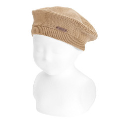 Buy Garter stitch beret NOUGAT in the online store Condor. Made in Spain. Visit the KNITTED BERETS section where you will find more colors and products that you will surely fall in love with. We invite you to take a look around our online store.