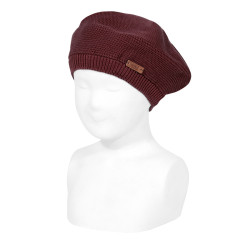 Buy Garter stitch beret GARNET in the online store Condor. Made in Spain. Visit the KNITTED BERETS section where you will find more colors and products that you will surely fall in love with. We invite you to take a look around our online store.